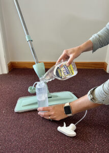 Digger wall cleanup pouring into spray mop
