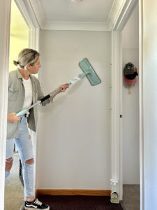 wipe wall using wall mop